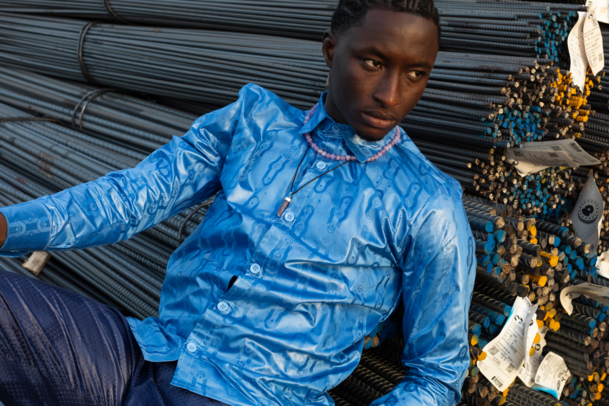 Closeup of a young man in a blue shirt