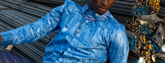 Closeup of a young man in a blue shirt