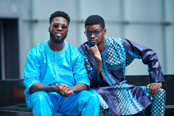 Two men checking the passers-by