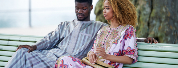 Couple sitting on bench enjoying the view